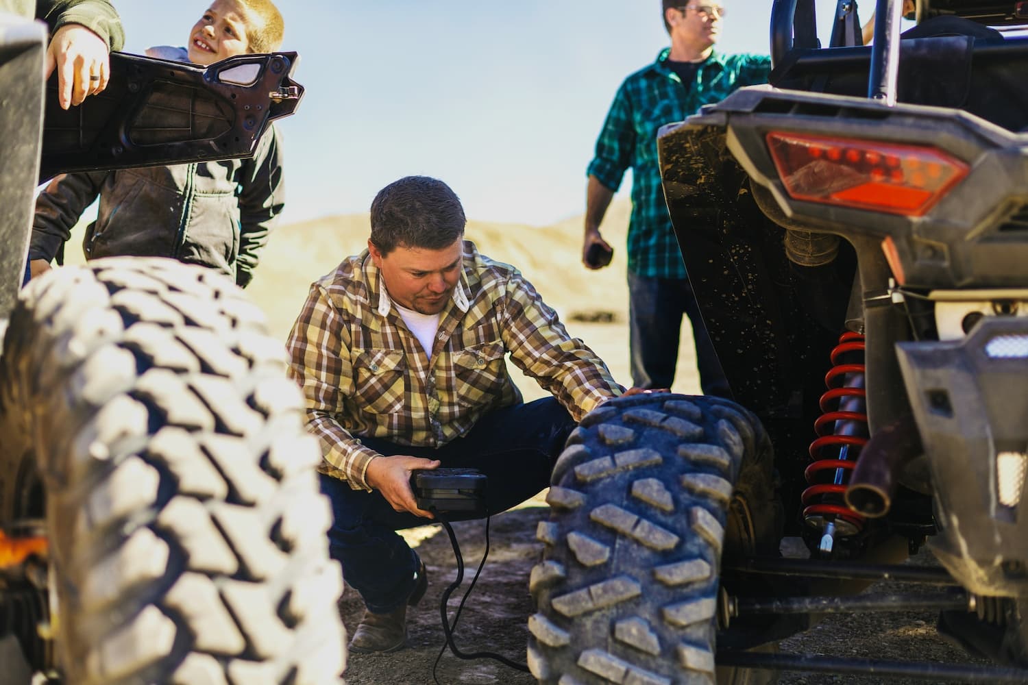 Mechanic working on atv